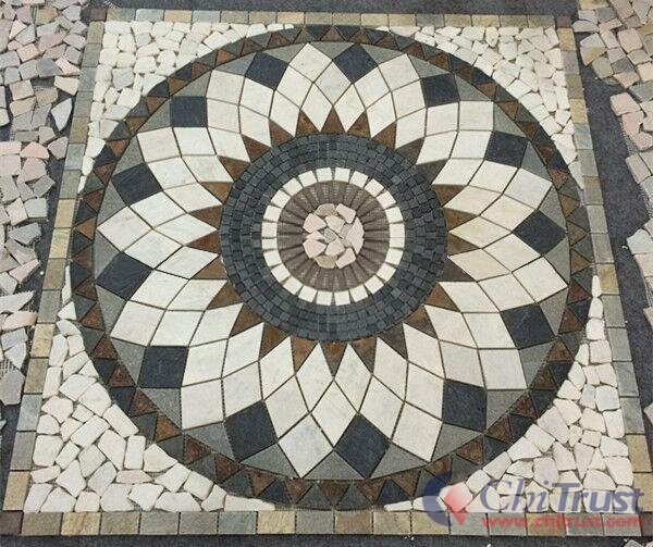 Slate and travertine mosaic pattern