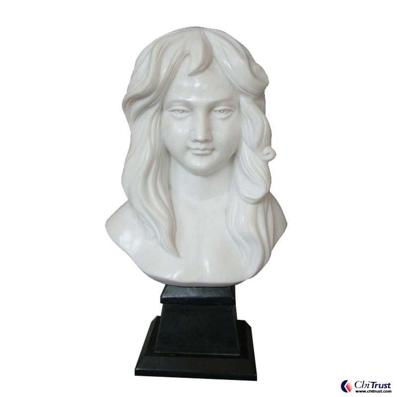 Stone woman head figurine